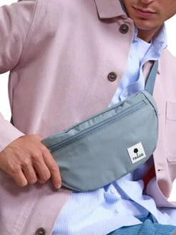 Banane bleue unie avec une fermeture zippée et une sangle réglable