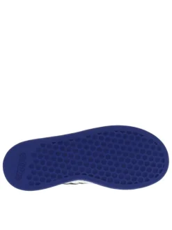 Baskets basses tennis blanches avec lacets plats et une bande auto-agrippante