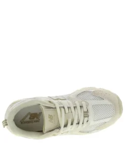 Baskets multisport 530 écrues avec multiples logos de la marques