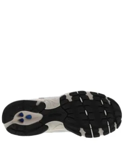 Baskets running blanches à talon plat en maille sur le pourtour