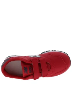 Baskets running rouges avec des semelles crantées et fermeture velcros