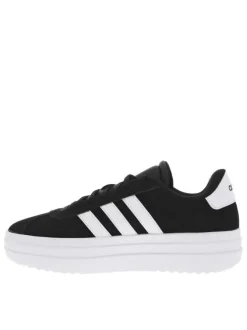 Baskets tennis noires à semelle à talon plateau et avec des lacets