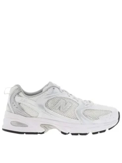 Baskets basses multisport 530 blanches et argentées en mesh avec lacets plats