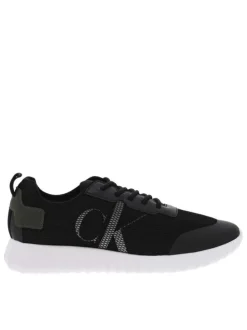 Baskets basses noires à semelle running à talon semi-compensé et tige slip-on