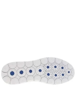 Baskets basses Slip-on en textile stretch texturé noir uni avec une semelle respirante et détails rouges