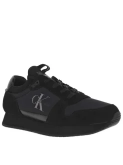 Baskets basses style running en cuir noir à talon plat avec logo iconique