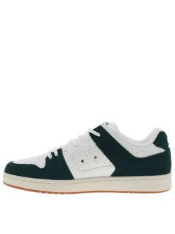 Baskets blanches à semelle plate avec un empiècement nubuck sur le pourtour