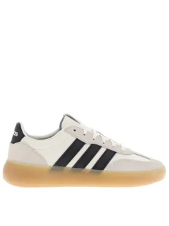 Baskets en cuir blanches avec semelle à talon plat et fermeture à lacets