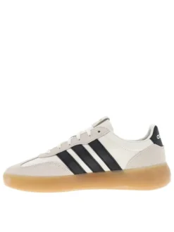 Baskets en cuir blanches avec semelle à talon plat et fermeture à lacets