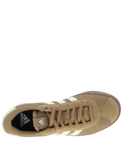 Baskets en cuir marron à talon plat avec des lacets tressés