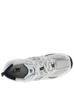 Baskets multisport blanches avec empiècements en maille résille