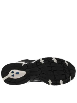 Baskets multisport en cuir noires avec empiècements tachetés et maille résille