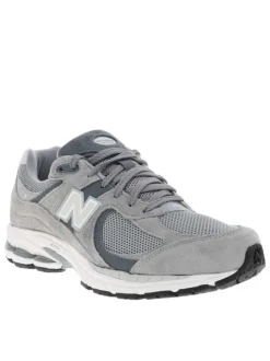 Baskets multisport 2002 grises à talon plat avec du mesh sur le pourtour