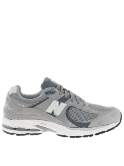 Baskets multisport 2002 grises à talon plat avec du mesh sur le pourtour