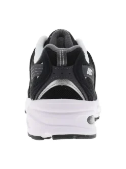 Baskets multisport noires à talon plat avec une languette d’aisance au col