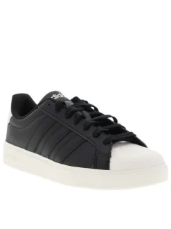 Baskets noires à talon plat avec des lacets et une semelle blanche