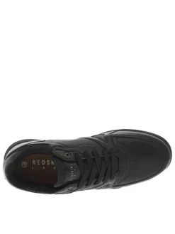 Baskets noires à talon plat avec des lacets noirs et un logo beige
