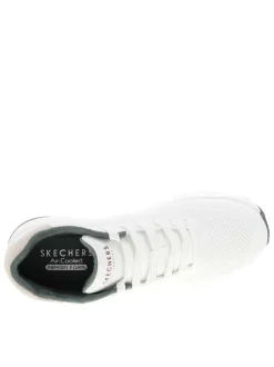 Baskets running blanches avec un talon compensé bas et des lacets