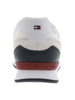 Baskets running blanches en cuir avec un talon plat et des lacets