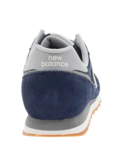 Baskets running 373 bleu marine avec un talon plat et un patch sur la languette
