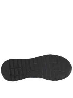 Baskets running en cuir bleu marine à talon compensé bas avec aspect matelassé