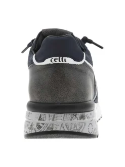 Baskets running en cuir bleu marine à talon compensé bas avec aspect matelassé