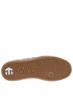 Baskets skate beiges en cuir à semelle marron avec logos verts et lacets plats