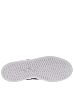 Baskets skate blanches à talon plat avec un logo en relief au talon