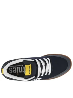 Baskets skate en cuir marine à semelle marron avec lacets et logo blancs