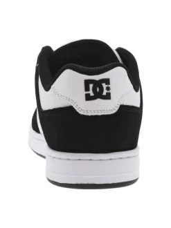 Baskets skate en cuir noires et blanches à talon plat avec des logos noirs