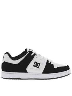 Baskets skate en cuir noires et blanches à talon plat avec des logos noirs