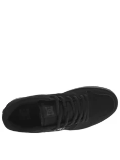 Baskets skate en cuir noires à semelle marron avec des lacets ronds