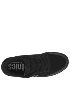 Baskets skate en cuir noires à talon plat avec logos et lacets plats noirs