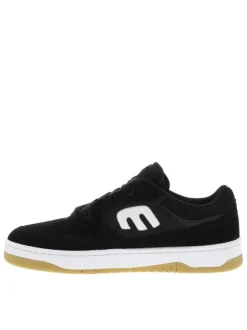 Baskets skate noires avec des talons plat et une languette épaisse