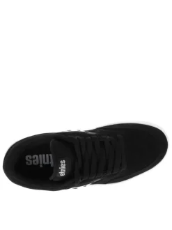 Baskets skate noires avec des talons plat et une languette épaisse
