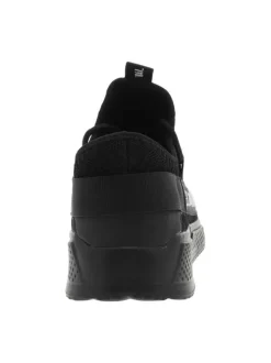 Baskets sneakers slip-on en textile stretch noir à semelle compensée