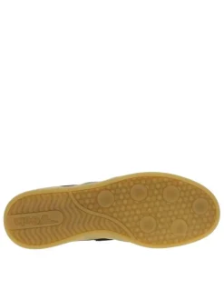 Baskets tennis en cuir blanches plates à lacets plats blancs avec bandes noires