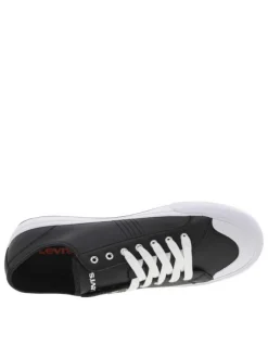 Baskets tennis noires avec nom de la marque floqué en blanc sur la languette