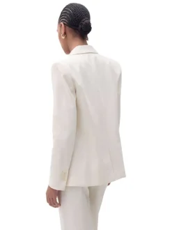 Blazer beige uni avec une coupe droite à manches longues et un col à revers