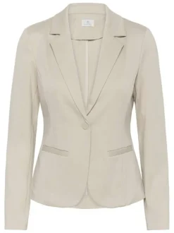 Blazer beige uni pourvu d'une coupe ajustée et d'un col à revers