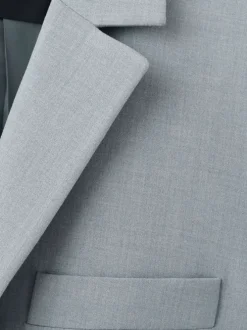 Blazer bleu gris uni avec une coupe droite et des manches longues