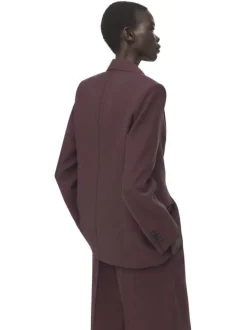 Blazer bordeaux uni pourvu d'une coupe droite et d'un col à revers