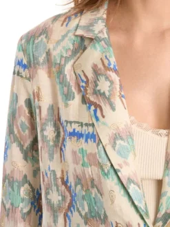 Blazer écru à motifs pourvu d'un col à revers et de manches longues