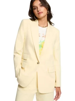 Blazer jaune à coupe droite pourvu d'un col à revers et de manches longues