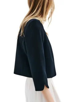 Blazer marine à coupe droite pourvu de manches longues avec petite fentes