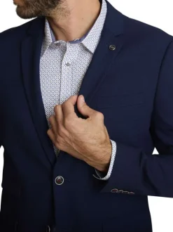 Blazer marine uni avec une coupe droite et des manches longues