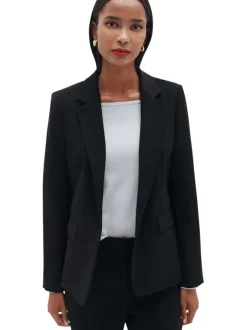 Blazer noir uni avec une coupe ajusté un col cranté et des manches longues