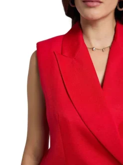 Blazer rouge sans manche coupe ajustée pourvu d'un col à revers