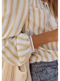 Blouse blanche pour femme avec rayures verticales coupe ample