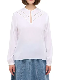 Blouse blanche unie avec un col tunisien et des manches longues